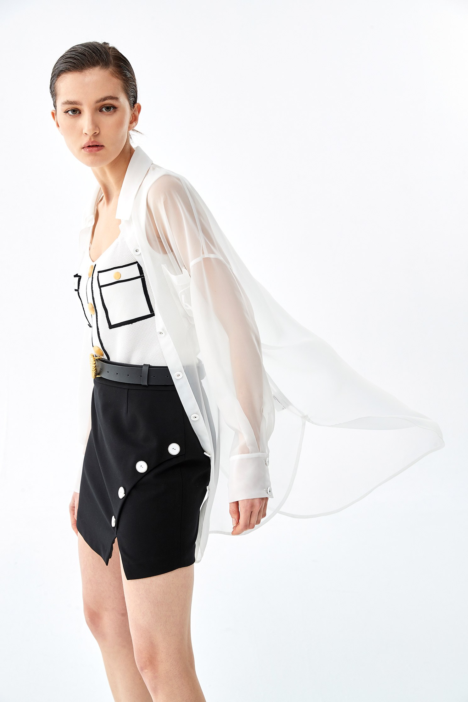 Fitted Mini Skirt With Contrast Button AppliqueShort skirt with colored buttons,Season (SS) Look,Mini skirts