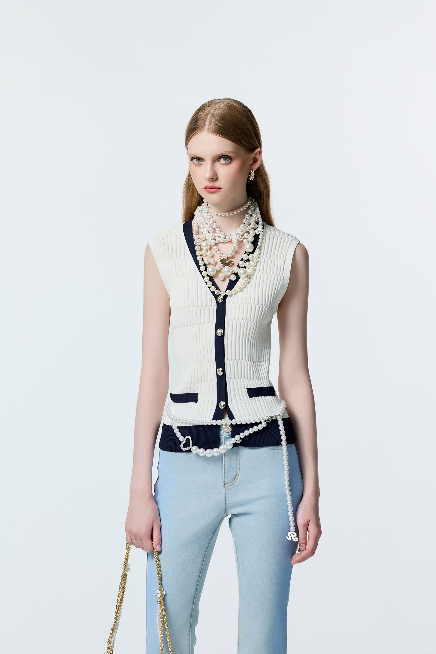 V-neck Navy Trim Knit VestV-neck Navy Trim Knit Vest,V-Neck T shirts,sleeveless tops,Office Looks,Tops,sleeveless tops,Season (AW) Look,Valentine,sleeveless tops,upperclass,Knitted,Knitted tops,Knitted tops